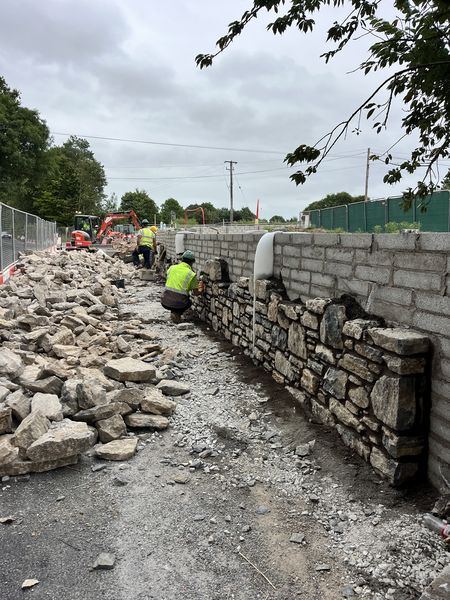 Reclaimed stone facing to blockwork retaining wall, Water Rock Road